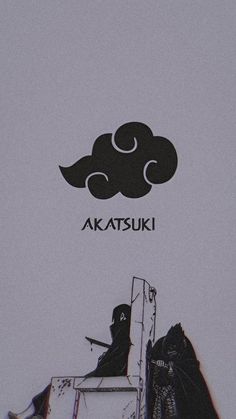 a person sitting on top of a bed under a black and white cloud with the word akatsuk above it