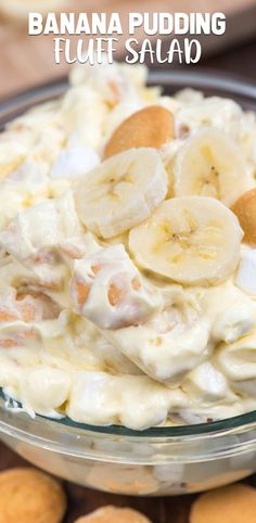 banana pudding in a glass bowl with almonds around it