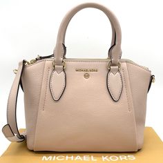 Brand New With Tag Michael Kors Sienna Medium Satchel Crossbody Bag Satchel Pebbled Leather 100% Leather From Tanneries Meeting The Highest Standards Of Environmental Performance From Tanneries Meeting The Highest Standards Of Environmental Performance Color: Soft Pink Gold-Tone Hardware 11”W X 8”H X 5.25”D Handle Drop: 4” Interior Details: Back Zip Pocket, Front Slip Pockets Lining: 100% Polyester Zip Fastening Dust Bag Not Included Imported Pink Michael Kors Shoulder Bag With Top Carry Handle, Michael Kors Pink Top Handle Satchel, Michael Kors Pink Satchel For Everyday Use, Michael Kors Pink Double Handle Satchel, Pink Michael Kors Double Handle Satchel, Chic Pink Michael Kors Satchel, Michael Kors Blush Bag With Detachable Strap, Pink Michael Kors Shoulder Bag With Handles, Classic Pink Michael Kors Shoulder Bag