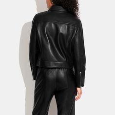 100% lamb leather Lining: 58% polyester 42% viscose Zip closure Slip pockets Length: 19 1/2 Model is 5'10 (178cm) chest 31 (79cm) waist 24 (61cm) hips 35 (89cm) and wears a size S Style No. CG669 Sling Bag Mini, Coach Outlet, Leather Jacket Black, Outlet, Leather Jacket, Leather, How To Wear, Black