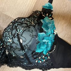 New With Tags. Black Lightly Padded Bra With Blue Teal Accents And Embroidery. Cute Crystal Charm At The Gore! Pockets For Additional Pads. Pads Not Included. Bought From Japan. Party Bra With Contrast Lace And Fitted Stretch, Party Bra With Contrast Lace And Fitted Design, Party Bra With Contrast Lace, Black Party Bra With Contrast Lace, Black Bra With Contrast Lace For Party, Embroidery Cute, Balconet Bra, Front Closure Bra, Purple Bras