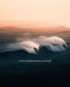 an ocean wave with the words never underestimate yourself