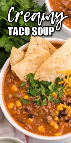 two white bowls filled with taco soup and tortilla chips on the side