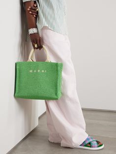 Marni's 'Basket' tote is woven from faux raffia in a boxy, structured shape. It's embroidered with a contrasting moniker and has sturdy canvas top handles along with a detachable shoulder strap. The fully lined interior is equipped with a zipped pocket and will easily fit your sunglasses, cosmetic bag and a full size wallet. Marni Basket Bag, Green Bag Outfit, Embroidered Tote Bag, Basket Tote, Embroidered Tote, Raffia Bag, Small Canvas, Orange Bag, Woven Bag