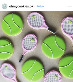 tennis balls and rackets decorated cookies on a table