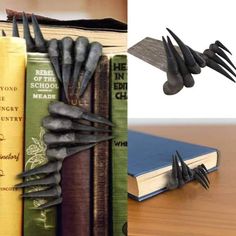 there are several different types of scissors on the table and in front of some books