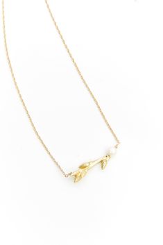 Naturally Elegant A natural branch that was cast and suspends beautifully from a gold plated chain with a pearl accent. Details: - Brass, - Pearls - Necklace 17" Long - Twig 2" Long Botanical Collection, Pearls Necklace, Gift Card Shop, Gold Plated Chains, Earring Necklace, Ring Necklace, Jewelry Sales, Sales Gifts, Personalized Jewelry