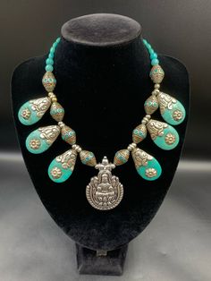 Amazing Tibetan Tara pendent Symbol pendent Turquoisel Stone and turquoise  beads Necklace tibetan jewellery necklace Turquoise Oxidized Spiritual Necklace, Spiritual Turquoise Necklace With Oxidized Finish, Traditional Turquoise Pendant Necklace With Polished Beads, Traditional Beaded Turquoise Pendant Necklace, Bohemian Silver Turquoise Necklace For Festivals, Silver Beaded Turquoise Necklace For Festivals, Silver Bohemian Turquoise Necklace For Festivals, Spiritual Turquoise Beaded Necklaces For Festivals, Spiritual Turquoise Pendant Necklace For Festival