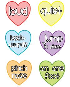 four heart shaped stickers with words on them