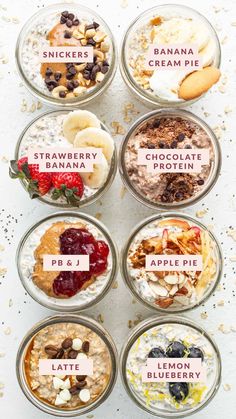 six glass bowls filled with different types of breakfast foods on top of a white surface