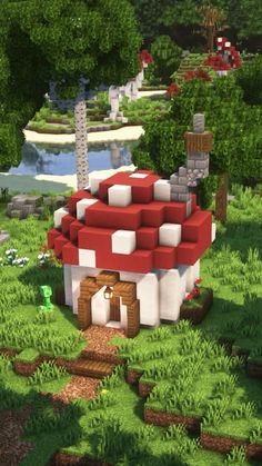 a mushroom house in the middle of a lush green field with lots of trees and bushes