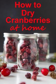 cranberries in jars with text overlay how to dry cranberries at home