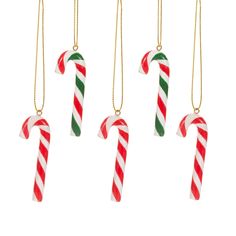 three candy canes hanging from gold chains on a white background, one is green and the other is red