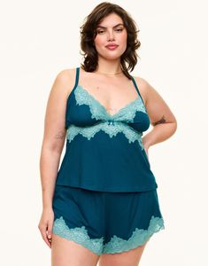 Look pretty in blue while you're catching some z's in our Lora cami and short set. This sleepwear set comes in a ribbed knit fabrication with lace triangle cups, cut-away lace detailing, and a fully adjustable crisscross back. The matching shorts have an easy elastic waistband and make this the perfect PJ set to lounge around in. (Available in plus-sizes 1X-4X.) Blue Lace Sleepwear For Loungewear, Lingerie Catalog, Sleepwear Sets, Sleepwear & Loungewear, Pj Sets, Victoria’s Secret, Lace Detail, Short Sets, Apparel Accessories