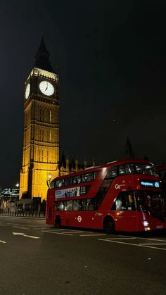 the big ben clock tower towering over the city of london, england at night time