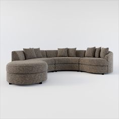 a large sectional couch with pillows on it's back and the seat facing outward