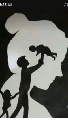 the silhouette of a man holding a child is shown in black and white, with an image of a bear behind him