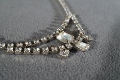 I am offering this fabulous vintage silver tone necklace. This piece is truly gorgeous, and it has the following features: * beautiful vintage necklace * silver tone * bib style * rhinestone * approx. 14 inches in length This is a fantastic and classic piece. There is tons of sparkle and shine with this piece. It will beautifully complement your upcoming fashion season. Buyer pays all shipping and handling. Murano Glass Necklaces, Tennis Style, Vintage Beads Necklace, Red Pendants, Dangle Necklaces, Long Beaded Necklace, Genuine Turquoise, Style Necklace, Glass Necklace