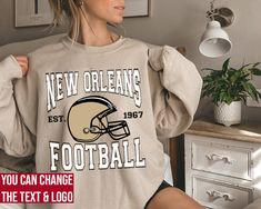 "New Orleans Football Sweatshirt , New Orleans Football shirt , Vintage Style New Orleans Football Sweatshirt , New Orleans Fan Gift , New Orleans Sweatshirt , Sunday Football -Please check Color and Size Charts before placing the order. You can find them in the listing's photos (Depending on what device you are viewing this listing colors may vary slightly). -Returns and exchanges are accepted only if there are defects \"No Extra Costs\" Sweatshirt :   Gildan 18000 -  Medium-heavy fabric (8.0 oz/yd² (271.25 g/m -   Loose fit -   Runs true to size -   50% cotton, 50% polyester -   Sewn-in label  T-shirt : Bella+canvas 3001 -   100% Airlume combed and ringspun cotton (fiber content may vary for different colors) -    Light fabric (4.2 oz/yd² (142 g/m -    Retail fit -    Tear away label - Houston Sweatshirt, England Football Shirt, Miami Football, Sunday Football, England Fans, New York Football, Baseball Sweatshirts, Tennessee Football, Football Sunday