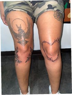 the legs of a woman with tattoos on them