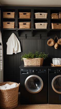 a washer and dryer in a laundry room with baskets on the wall above them