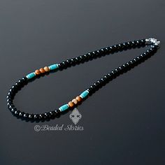 "This handmade black beaded necklace is made with 6 mm black onyx beads and features two focal points that add color and character to this masculine piece - three picture jasper beads strung between two Howlite Turquoise tubes accentuated by silver tone spacer beads. This necklace is lightweight and has a nice warm feeling when in contact with your skin. Black Onyx jewelry for men is always in trend and the combination of the lustrous black accented by blue and yellow brown hues lends this men's Mens Choker, Mens Choker Necklace, Mens Beaded Necklaces, Black Beaded Necklace, Black Onyx Jewelry, Native American Necklace, Necklace Mens, Surfer Necklace, Onyx Jewelry