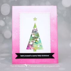 a card with a christmas tree on it