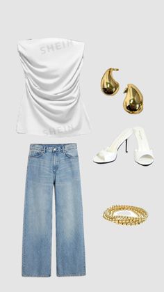 a white top and jeans outfit with gold accessories