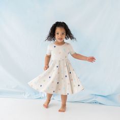 Cut from soft, stretchy bamboo fabric, this twirl dress features a full skirt so your toddler can spin in style. The classic design of the dress can easily be dressed up or down, making it the perfect everyday outfit. 97% Rayon made from Bamboo, 3% Spandex 240 gsm creates a flattering drape Ballerina neckline Womens Matching Sets, Boho Moon, Lounge Robes, Twirl Dress, Everyday Outfit, Bamboo Fabric, Family Outfits, Long Sleeve Pyjamas, Toddler Dress