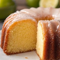 a close up of a cake on a plate with one slice taken out of it