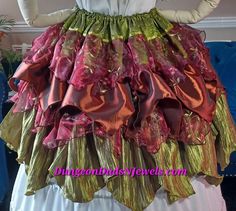 Custom Made in the USA to YOUR *Measurements Choose Colors 3 Tier Petal Skirt ) PLEASE READ LISTING FULLY & ASK QUESTIONS  PRIOR TO PURCHASE (1) Petal Skirt. Custom made to your measurements. 3 Tier. Multi petal Length to 32" at bottom Petal point. Taffeta & sheers Draw Waist (listing is for petal skirt only)  140" plus circumference at hemline. Rolled finished hemline. Hand or Gentle Cold wash. Fluff/Line dry. Steam Press Synthetic. See Taffeta Colors Here https://dungeondudsnjewels.smugmug.com/DDNJTaffetaGallery (copy & paste into browser) PLEASE SELECT NUMBERED COLORS ONLY.   Please verify color availability prior to purchase as your color may no longer be available or may need to be custom ordered See Organza Colors Here  https://dungeondudsnjewels.smugmug.com/DDNJOrganzaGallery (copy Spring Ruffled Skirt For Cosplay, Fitted Fantasy Skirt For Costume Party, Ren Faire Fairy Skirt, Fitted Fantasy Skirt For Fantasy Events, Petal Skirt, Pirate Fairy Costume, Layered Fairy Skirt, Flower Petal Skirt Fairy, Harajuku Ruffle Skirt For Cosplay