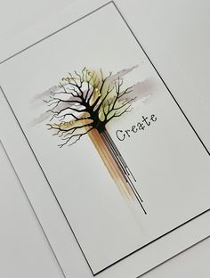 a card with an image of a tree and the words create on it