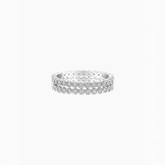 Easily add a hint of luxury and glam to your everyday outfit with our Celeste Tennis Ring Set. This set is a treat for your eyes - the sparkling gems wrapping all across your finger will have you admiring it over and over. Add even more sparkle and stack it with our Wendy Ring and Cassie Ring! - Rhodium Plating over Brass- Cubic Zirconia- Available in White Gold only Stackable Crystal Ring In Diamond White, Dazzling Stackable Diamond Ring, Dazzling Diamond White Stackable Rings, Silver Stackable Rings With Sparkling Stones, Sparkling Cubic Zirconia Stackable Rings, Dazzling Stackable Round Rings, Dazzling Round Stackable Rings, Tennis Ring, Everyday Outfit