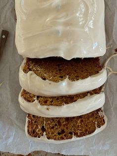 slices of carrot bread with icing on top