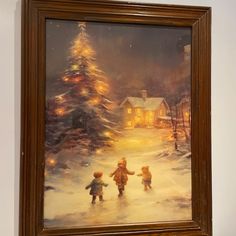 a painting of two children playing in the snow with a lit christmas tree behind them