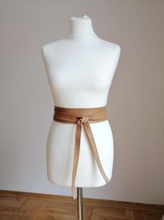 You are purchasing a 4 inch wide belt (at widest point). The pictures are taken on 23" waist mannequin in many colors and different wideness. *IMPORTANT SIZING TIP: When selecting the size you need, please select the size that fits the best your waist measurement and the both ends will be 12" - 15" long. If you want the ends to be shorter then choose one size down!!  XS - CLOTHING SIZE US 0 to 2 total length about 70 inches to fit waist 23 to 25 inches S - CLOTHING SIZE US 4 to 6 total length about 76 inches to fit waist 26 to 27 inches M - CLOTHING SIZE US 8 to 10 total length about 82 inches to fit waist 28 to 29 inches L - CLOTHING SIZE US 12 to 14 total length about 90 inches  to fit waist 30 to 33 inches XL - CLOTHING SIZE US 16 to 18 total length about 98 inches  to fit waist 34 to 3 Plus Size Belts, Obi Belt, Waist Measurement, Waist Cincher, Black Leather Belt, Suspender Belt, Wide Belt, Serbia, Suspenders