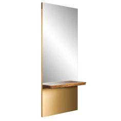 a mirror on the wall with a shelf in front of it and a wooden top