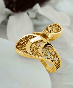 Enhance your style with this stunning swirling filigree and gold plated sterling silver leaf-shaped bypass ring. Handcrafted with 14k gold plated sterling silver, this cocktail ring features intricate filigree details that add a touch of elegance and uniqueness to any outfit. This bypass ring is not only beautiful but also comfortable to wear. Made from pure 925 silver and highly polished, it comes with a velvet pouch, and a luxurious gift box, making it a perfect gift option for special occasio Unique Gold Filigree Ring With Intricate Design, Gold Plated Filigree Ring For Anniversary, Elegant Gold Filigree Ring, Elegant Gold Plated Filigree Ring, Elegant Gold Filigree Open Ring, Elegant Filigree Open Ring Jewelry, Gold Open Filigree Ring For Formal Occasions, Gold Open Ring Filigree For Formal Occasions, Elegant Filigree Open Ring Gift