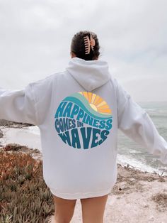 Happiness Comes In Waves Back Hoodie, Trendy Sweatshirts for Women, Vsco hoodie, Aesthetic Sweatshirt, Summer Vibes Hoodie,Tumblr Sweatshirt 🌟 Welcome to Our Shop! 🌟 Please Review All Photos Carefully for Details. 🌟 Select Your T-Shirt Size from the Dropdown Menu Next to the Product Image. 🌟 Choose Your T-Shirt Color from the Options Provided in the Second Picture. 🌟 Customize Your Order by Using the "Add Message to Seller" Link During Checkout. 🌟 Shipping Time Varies Depending on Your Loc Vsco Style Hoodie Sweatshirt With Letter Print, Vsco Style Long Sleeve Hoodie With Letter Print, White Vsco Style Letter Print Sweatshirt, Vsco Style Sweatshirt Hoodie With Letter Print, Vsco Hoodie With Letter Print, Vsco Style Letter Print Hoodie Sweatshirt, Vsoc Style Hoodie Sweatshirt With Letter Print, White Vsco Hoodie For Streetwear, Vsco Graphic Print Hooded Sweatshirt