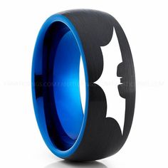 the batman symbol is on this black and blue ring