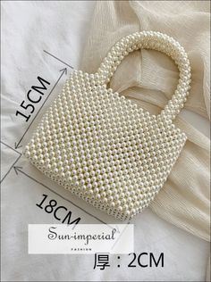 Shape:Casual Tote Origin:Mainland China Main Material:Beaded Closure Type:OPEN Hardness:SOFT Exterior:NONE Style:vintage Lining Material:Polyester Occasion:Versatile Gender:WOMEN Pattern Type:Solid Number of Handles/Straps:Single Interior:No Pocket Decoration:Beading,PEARL Item Type:Handbags Texture of lining:Pearl Luggage size:MINI/Mini pattern:purity Fashion Style of Luggage:Small package Type of outer bag:Cover pocket style:Women's Slant Bag Number of shoulder straps:Single root Fabric textur Summer Shoulder Bag With Pearl Handle, Beige Tote Shoulder Bag For Party, Spring Party Shoulder Bag With Pearl Handle, Summer Party Evening Bag With Pearl Handle, Elegant Beaded Summer Bags, Spring Party Bags With Pearl Handle, Summer Party Shoulder Bag With Pearl Handle, Beaded Beige Bags For Party, Summer Evening Bag With Pearl Handle, Handheld