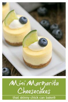 mini margarita cheesecakes on a plate with blueberries and avocado garnish