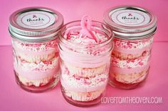 three mason jars filled with pink and white confetti