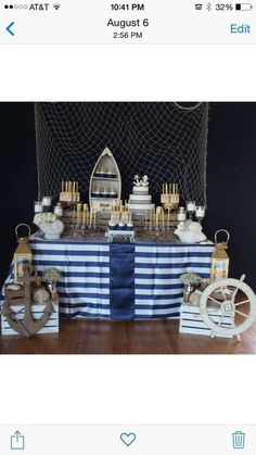 a table topped with lots of cakes and desserts