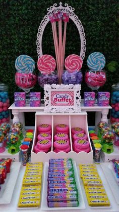 candy buffet with lollipops, marshmallows and candies