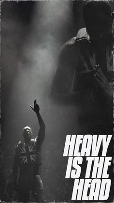 the poster for heavy is the head shows a man with his hand in the air