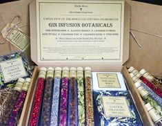 an assortment of gin infused botanicals in a box