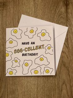 an egg - cellent birthday card with smiley eggs on it, says have an egg - cellent birthday