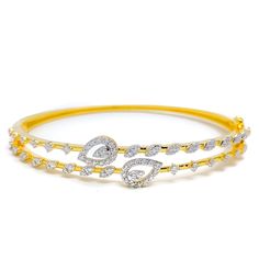 This exquisite 18k gold bangle bracelet, weighing 15.3 grams, features a stunning leaf-accented design adorned with dazzling diamonds. The yellow gold finish enhances its luxurious appeal, making it perfect for any special occasion. The bangle is set with 0.97 carats of F-G color, VS quality diamonds in round brilliant cut shapes. With an oval opening of 2.4 inches, this piece offers both elegance and comfort. The bangle is openable, designed with a push snap lock and clasps for added convenienc Yellow Gold Cubic Zirconia Diamond Bangle, Dazzling Gold Bangle Bracelet With Diamond Accents, Gold Bangle Bracelet With Diamond Accents, Dazzling Yellow Gold Diamond Bangle Bracelet, Dazzling Diamond Bracelets With Elegant Design, Dazzling Bangle Bracelet With Elegant Design, Dazzling Diamond Bracelet With Elegant Design, Dazzling Cubic Zirconia Gold Bangle Bracelet, 18k Gold Bangle