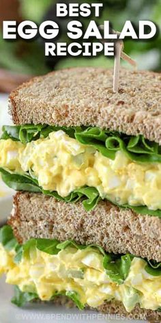 an egg salad sandwich with lettuce and cheese